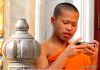 8 Buddhist Monk With a Smart Phone